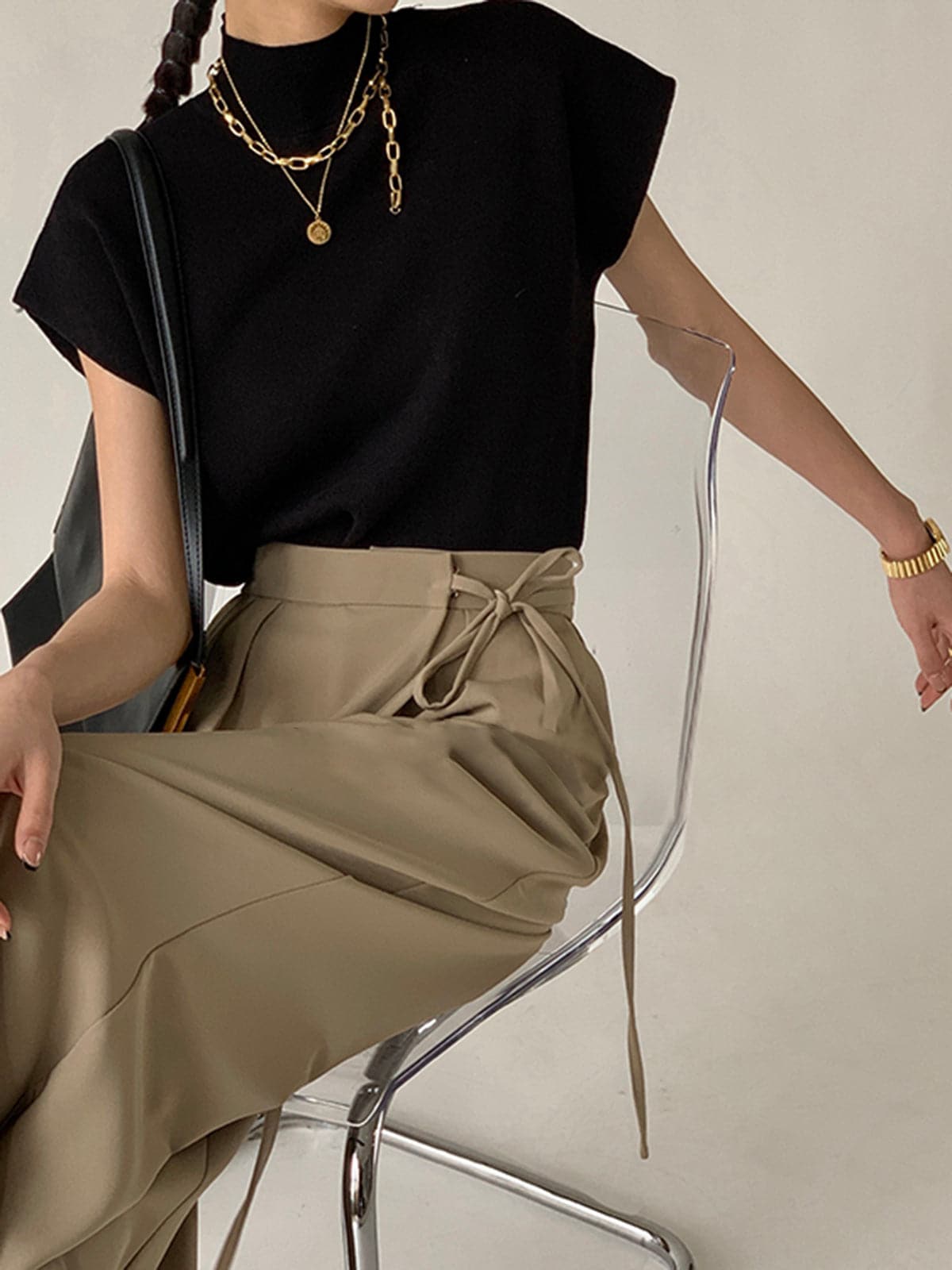 Chloe – Mouwloze Gebreide Top met Hoge Hals