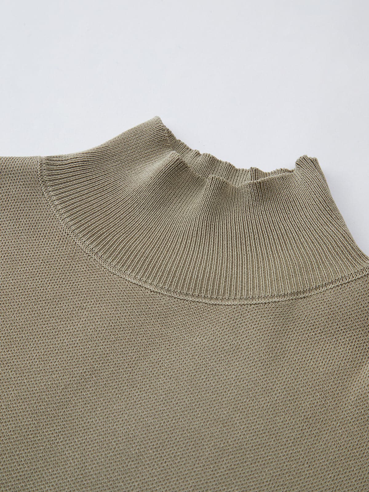 Chloe – Mouwloze Gebreide Top met Hoge Hals