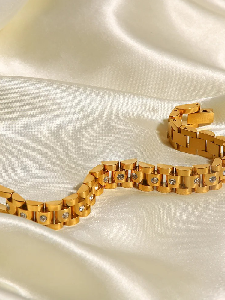 Aleida - Nora Brede Gouden Schakelarmband met Zirkonia
