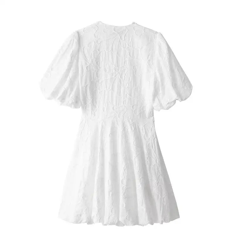 Philomijn - Elegante witte mini jurk met pofmouwen