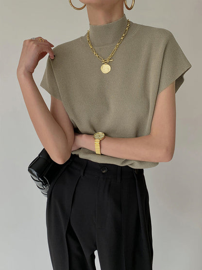 Chloe – Mouwloze Gebreide Top met Hoge Hals