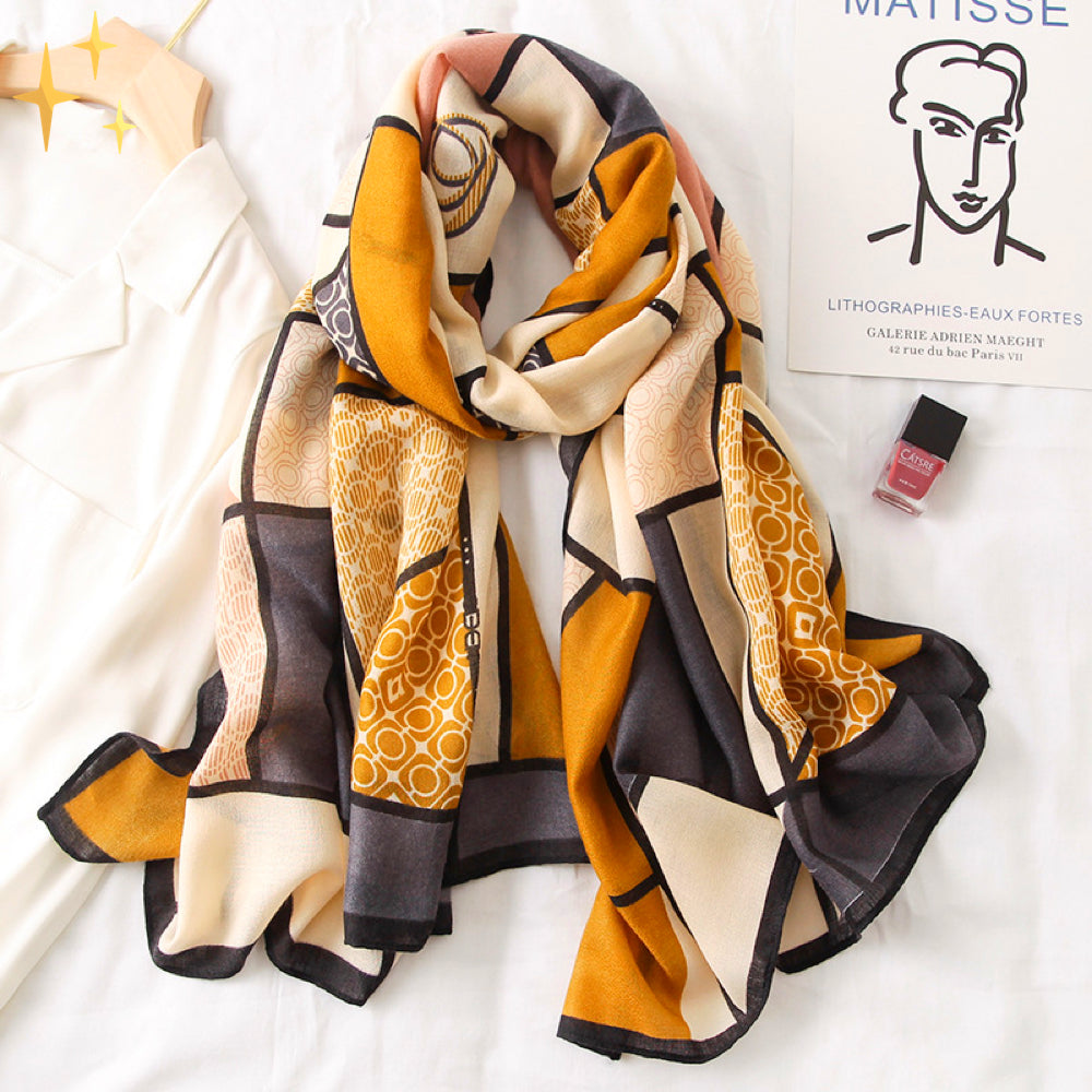 Amelie Chique Lichte Sjaal met Kleurrijke Designs om Warm en Modieus de Lente door te komen